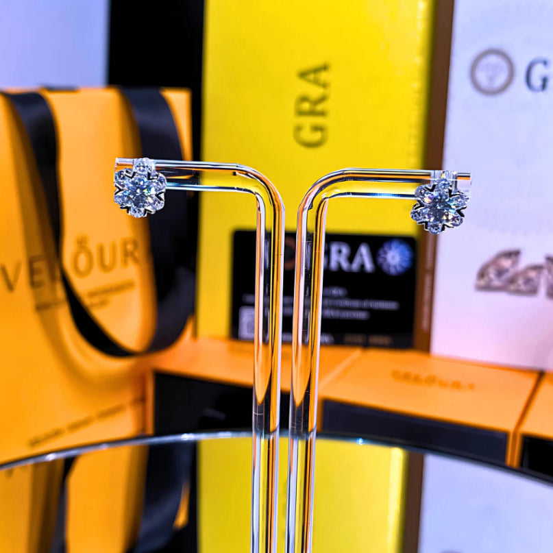 Radiant star-shaped moissanite with sparkling halo setting in sterling silver. Celestial-inspired design delivers brilliant fire and scintillation for sophisticated everyday glamour.