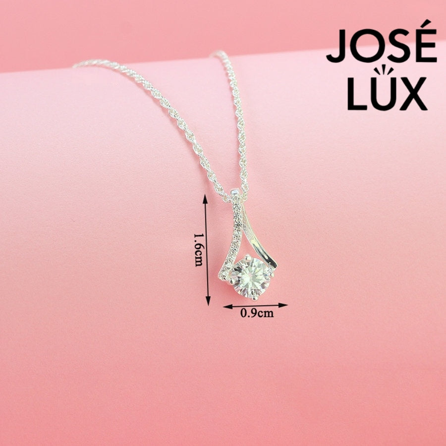 Sleek 0.8ct round moissanite angular frame pendant showcases modern geometric design with pavé-accented linear elements, expertly constructed in premium sterling silver.