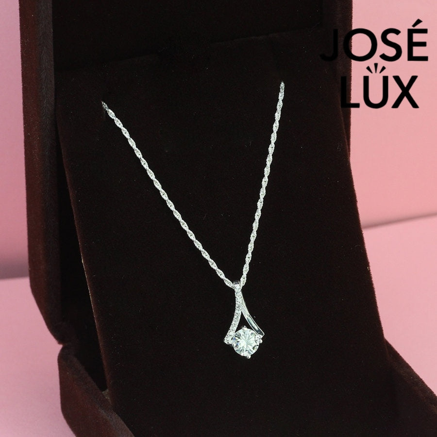 Sleek 0.8ct round moissanite angular frame pendant showcases modern geometric design with pavé-accented linear elements, expertly constructed in premium sterling silver.