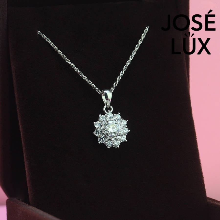 Spectacular 0.8ct round moissanite multi-halo cluster pendant delivers extraordinary brilliance with layered stone arrangement, magnificently handcrafted in polished sterling silver jewelry.