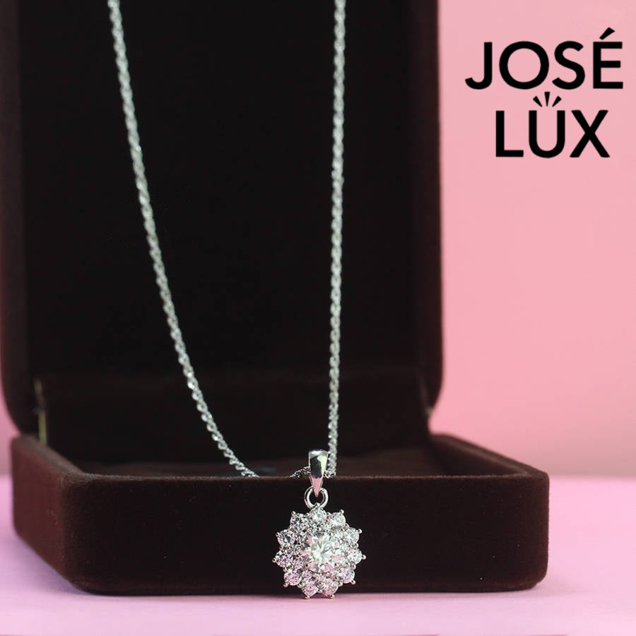 Spectacular 0.8ct round moissanite multi-halo cluster pendant delivers extraordinary brilliance with layered stone arrangement, magnificently handcrafted in polished sterling silver jewelry.