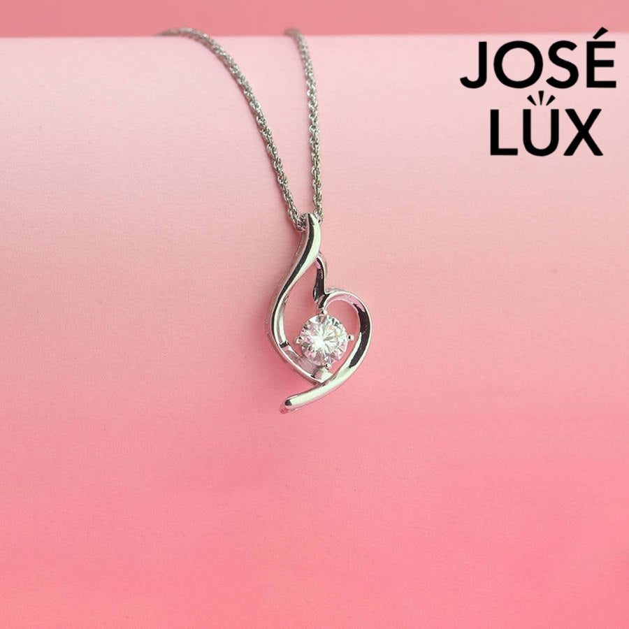 Modern 0.8ct round moissanite swirl solitaire pendant displays graceful flowing curves that beautifully cradle the brilliant stone in sleek sterling silver craftsmanship.