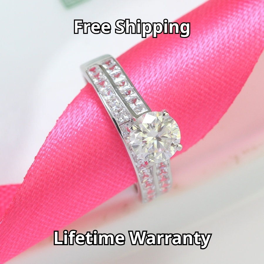 Stunning harmony set includes 1.25ct moissanite engagement ring with matching channel-set wedding band, beautifully crafted in sterling silver.