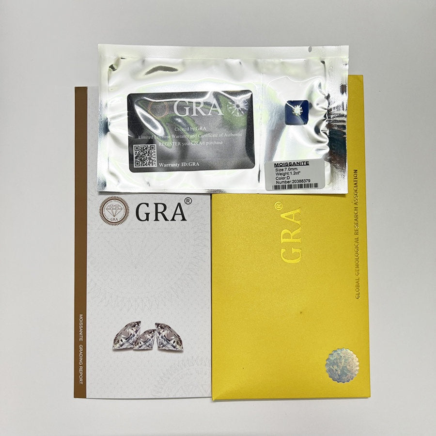 Elegant cathedral setting showcases brilliant round moissanite with sparkling pavé accents along the band for timeless sophistication and style.