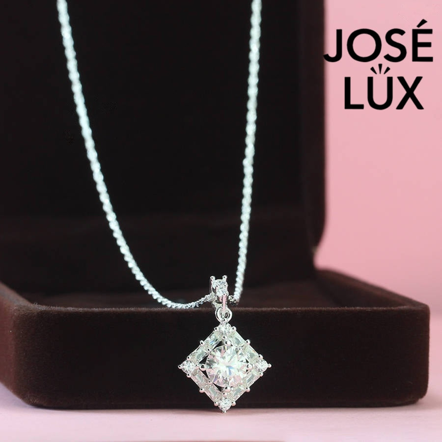 Bold 1.2ct princess cut moissanite diamond shape halo pendant features striking geometric design with diagonal setting, impeccably finished in gleaming sterling silver.