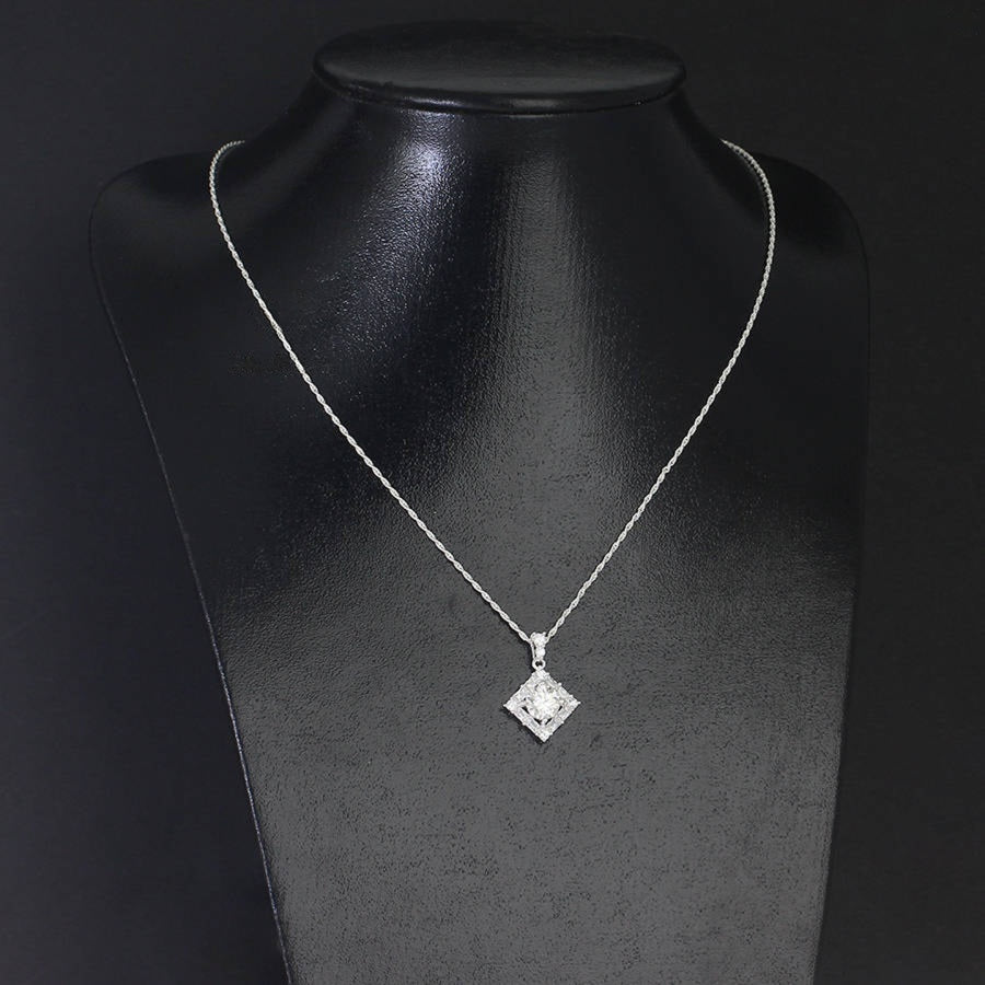Bold 1.2ct princess cut moissanite diamond shape halo pendant features striking geometric design with diagonal setting, impeccably finished in gleaming sterling silver.