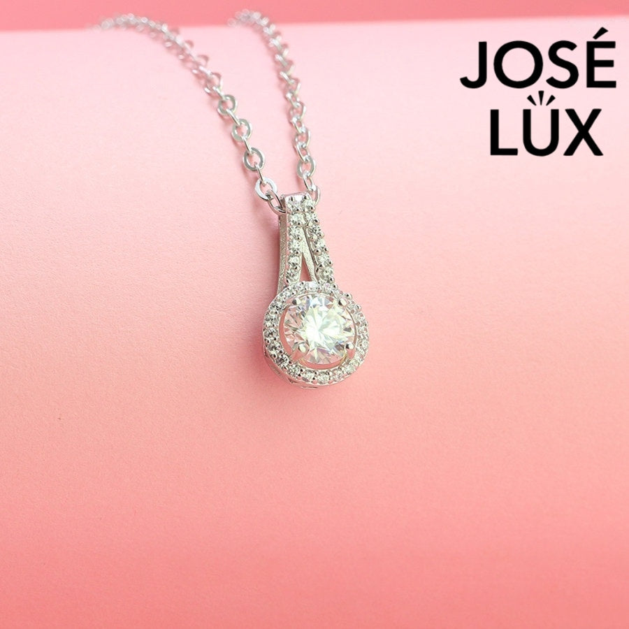 Stunning 1ct round moissanite vintage halo drop pendant combines classic elegance with Art Deco flair, featuring pavé details expertly set in sterling silver.