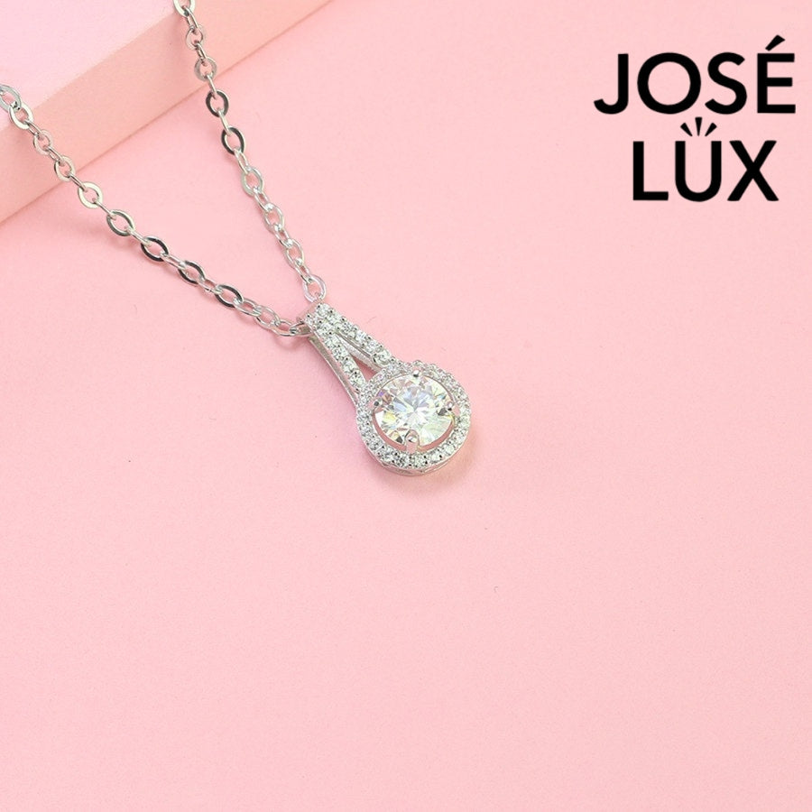 Stunning 1ct round moissanite vintage halo drop pendant combines classic elegance with Art Deco flair, featuring pavé details expertly set in sterling silver.