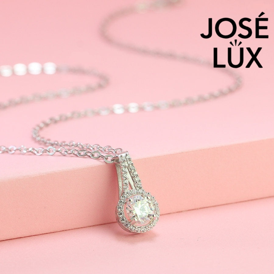 Stunning 1ct round moissanite vintage halo drop pendant combines classic elegance with Art Deco flair, featuring pavé details expertly set in sterling silver.