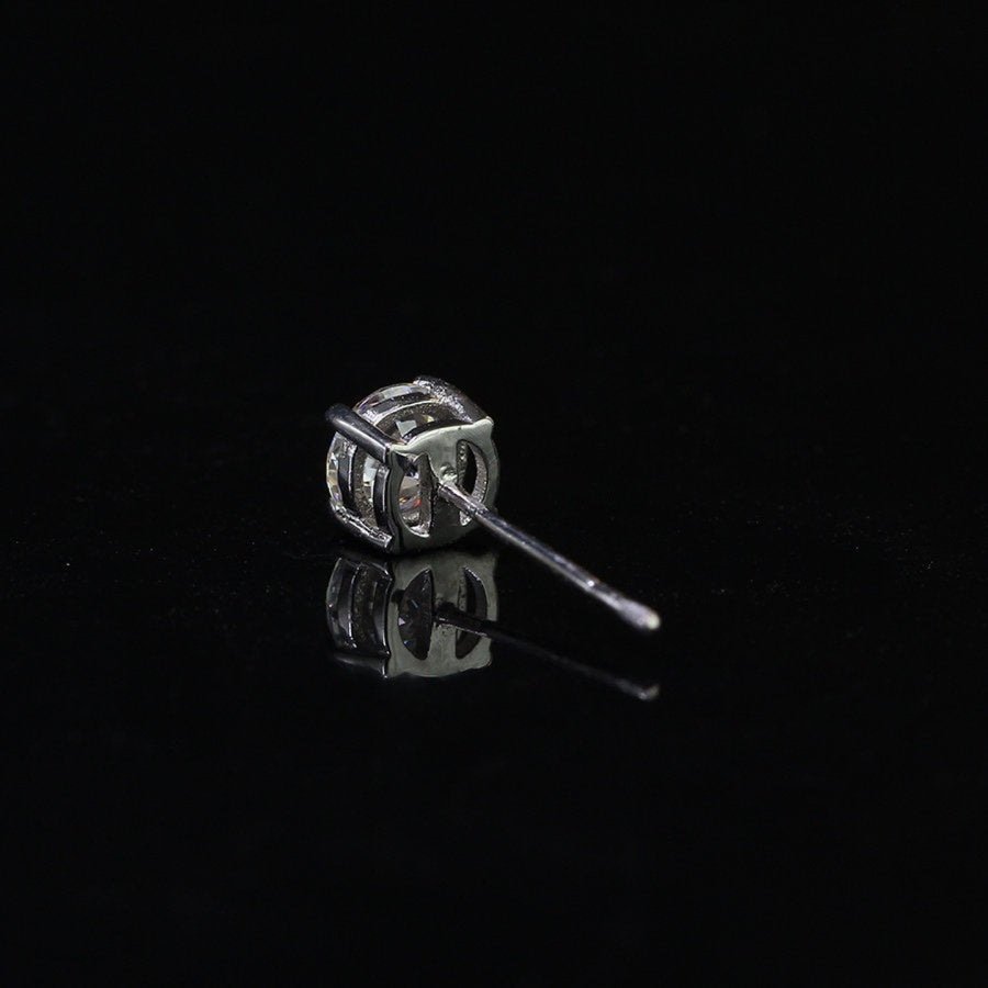Back view of Round Moissanite Stud Earring for Men in sterling silver with secure push-back post, 0.5ct brilliant-cut stone in basket setting.