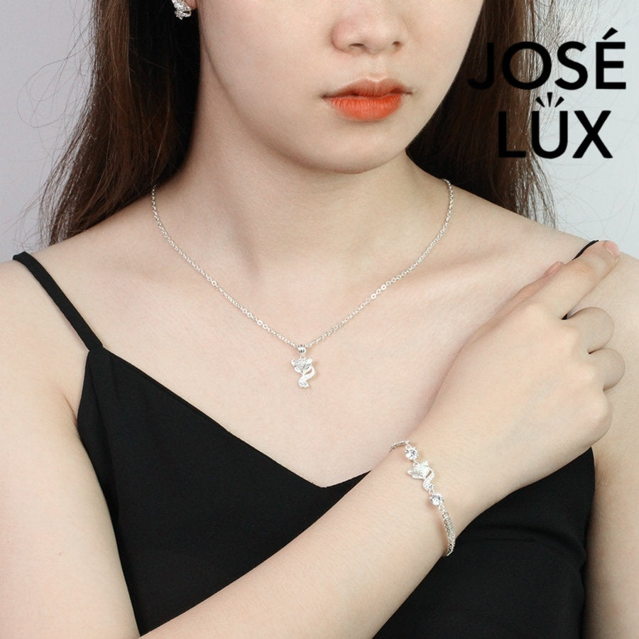 Fox charm tennis moissanite bracelet in sterling silver showcases charming animal centerpiece with two brilliant stones totaling 1.02 carats on classic chain.