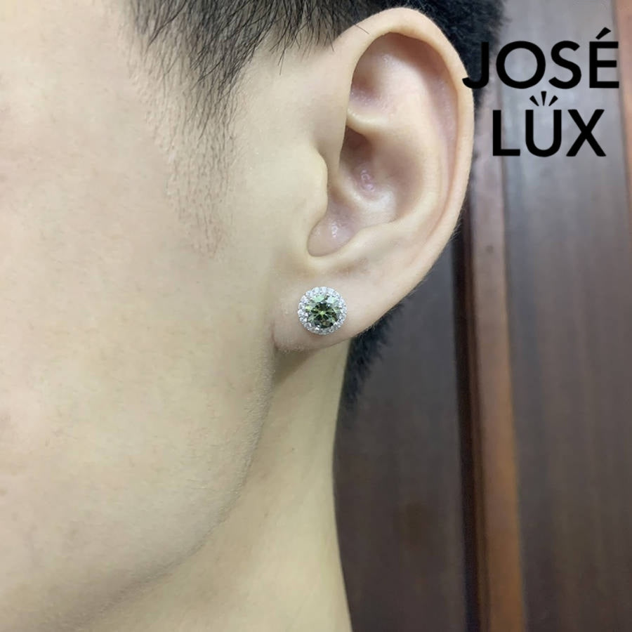 Sterling silver green moissanite halo stud earring worn by a man, showcasing its elegant 0.8ct sparkle and secure push-back closure.