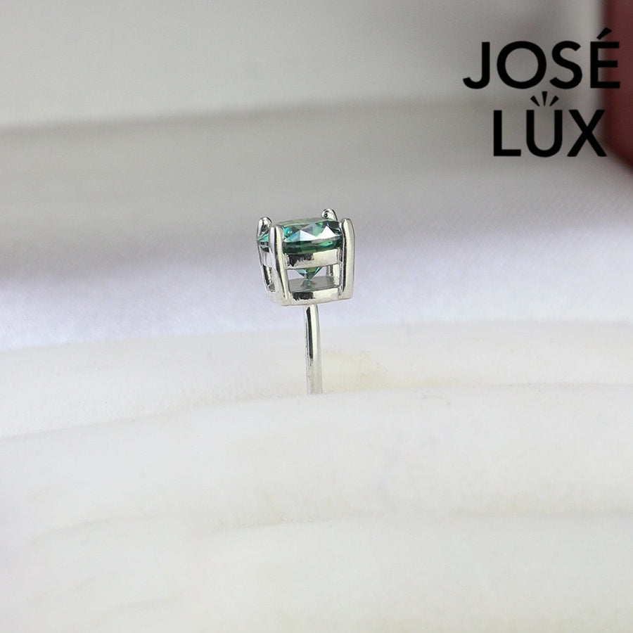 Green Moissanite Stud Earrings for Men - Sterling Silver (0.8ct) displayed upright to show gemstone cut and silver setting details.
