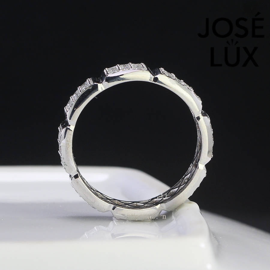 Side view of Men's Sterling Silver Moissanite Eternity Band Ring highlighting the intricate inner lattice design and full eternity band structure.