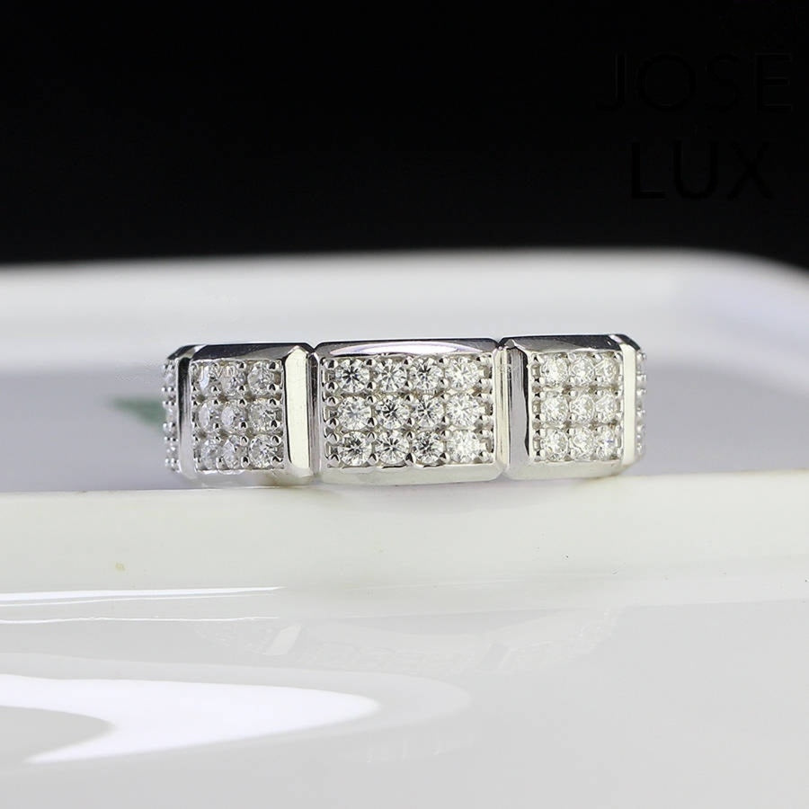 Front view of Men's Sterling Silver Moissanite Eternity Band Ring showing geometric segmented pavé layout with sparkling moissanite stones.