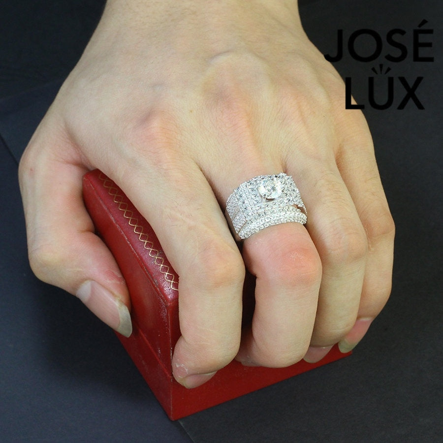 Men's Sterling Silver Moissanite Ring 1.2CT with Princess Halo Band worn on hand, emphasizing its luxurious and bold appearance.