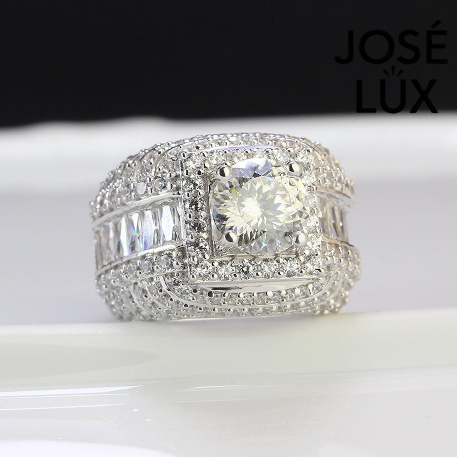 Front view of Men's Sterling Silver Moissanite Ring 2CT with layered halo and round-cut moissanite centerpiece surrounded by pavé stones.