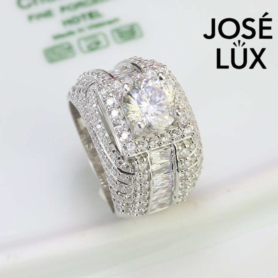 Top view of Men's Sterling Silver Moissanite Ring 2CT showing the brilliant round moissanite and layered halo with channel-set baguettes.