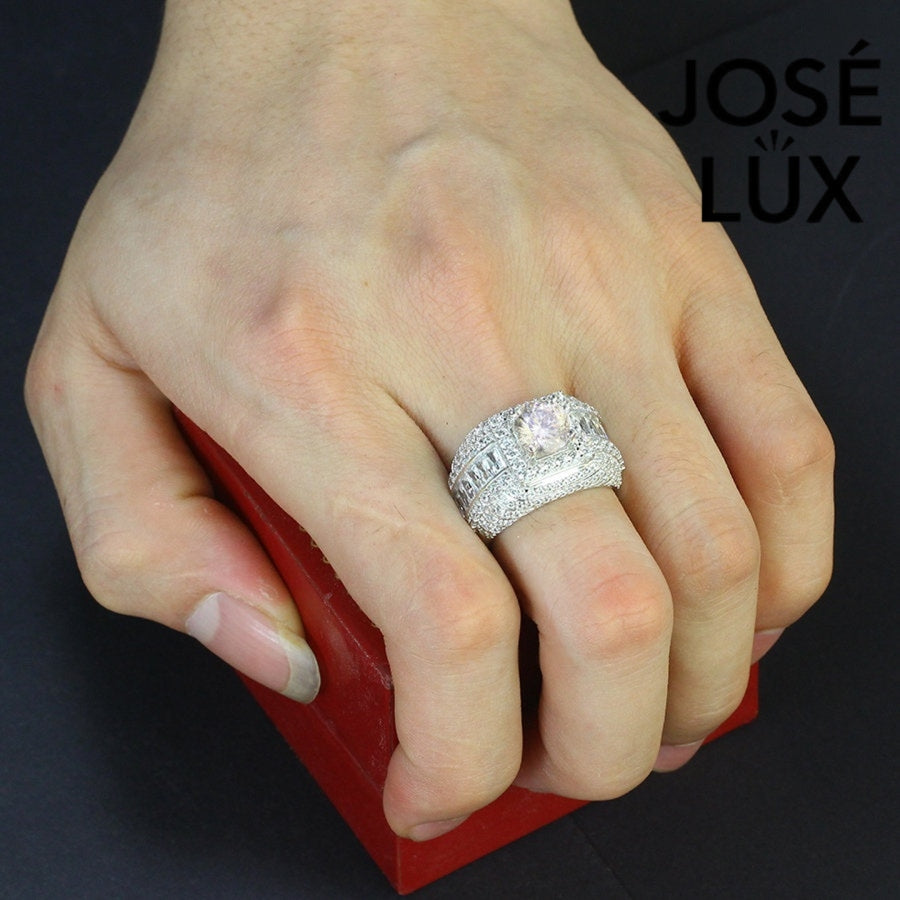 Men's Sterling Silver Moissanite Ring 2CT worn on hand, displaying its bold layered halo design and sparkling moissanite centerpiece.