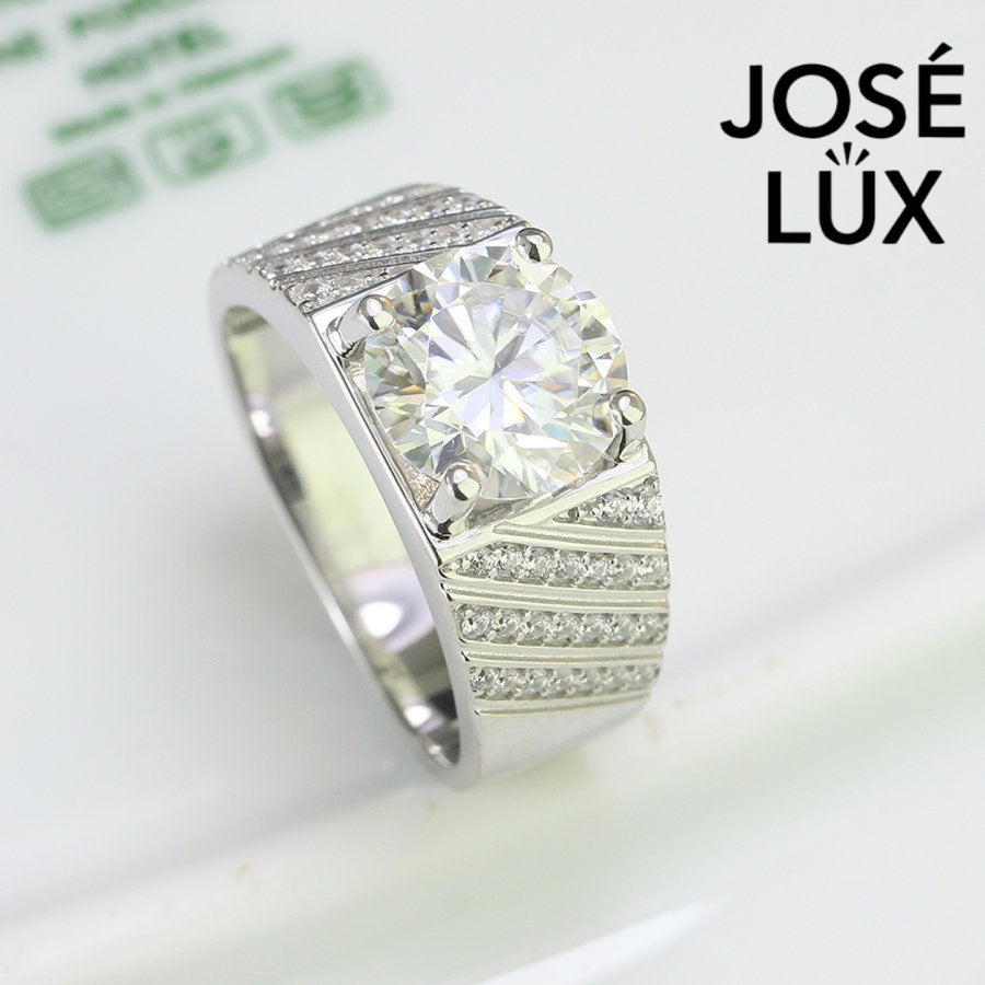 Elegant Men's Moissanite Ring 4CT in sterling silver with diagonal pavé shoulders, showcasing a high-polish finish and bold masculine design.