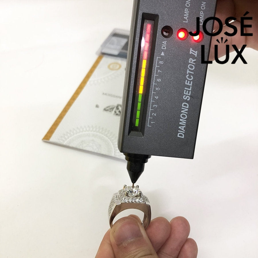 Moissanite authenticity test being performed on Men's Sterling Silver Moissanite Ring 4CT with Square Halo Platform using a diamond selector tool.