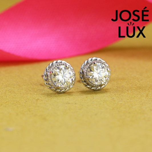 Elegant round moissanite with crown bezel setting in sterling silver. Regal design delivers brilliant fire and exceptional clarity for sophisticated everyday elegance.