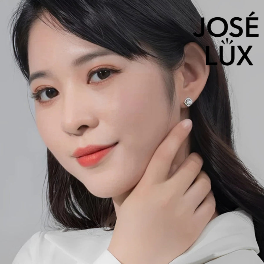 Brilliant cushion-cut moissanite with sparkling halo setting in sterling silver. Timeless elegance and exceptional fire make these studs perfect for everyday sophistication.