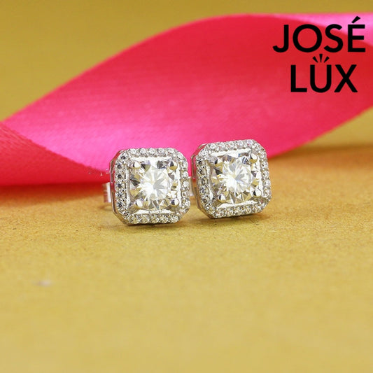 Sophisticated princess-cut moissanite with sparkling halo setting in sterling silver. Square silhouette delivers brilliant fire and exceptional clarity for timeless everyday elegance.