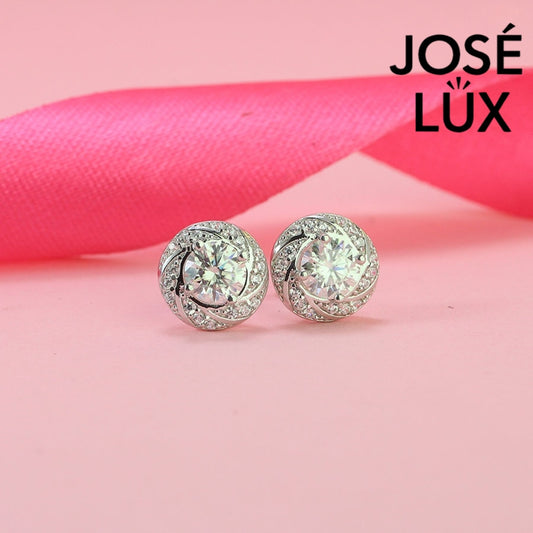 Elegant spiral halo moissanite with sparkling setting in sterling silver. Dynamic swirl design delivers brilliant fire and scintillation for sophisticated everyday elegance.