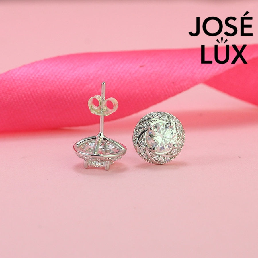 Elegant spiral halo moissanite with sparkling setting in sterling silver. Dynamic swirl design delivers brilliant fire and scintillation for sophisticated everyday elegance.