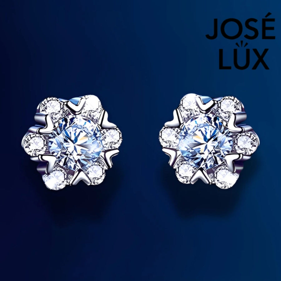 Radiant star-shaped moissanite with sparkling halo setting in sterling silver. Celestial-inspired design delivers brilliant fire and scintillation for sophisticated everyday glamour.