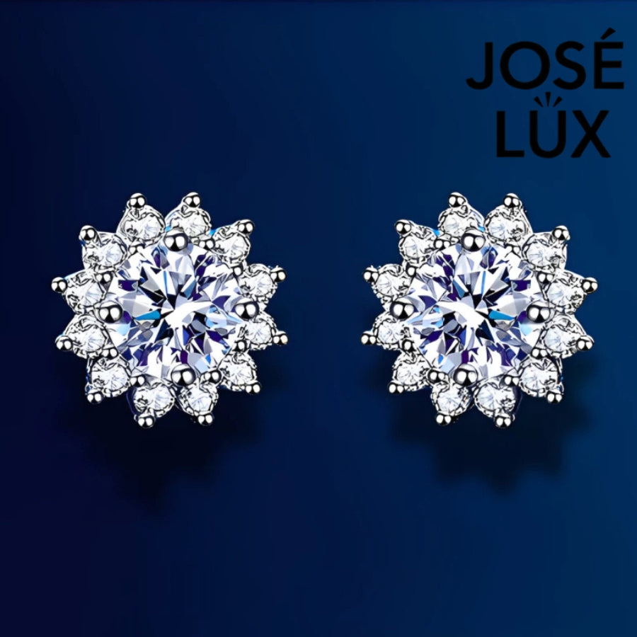 Brilliant sunburst-inspired moissanite with sparkling halo setting in sterling silver. Radiant design captures exceptional fire and scintillation for luminous everyday elegance.