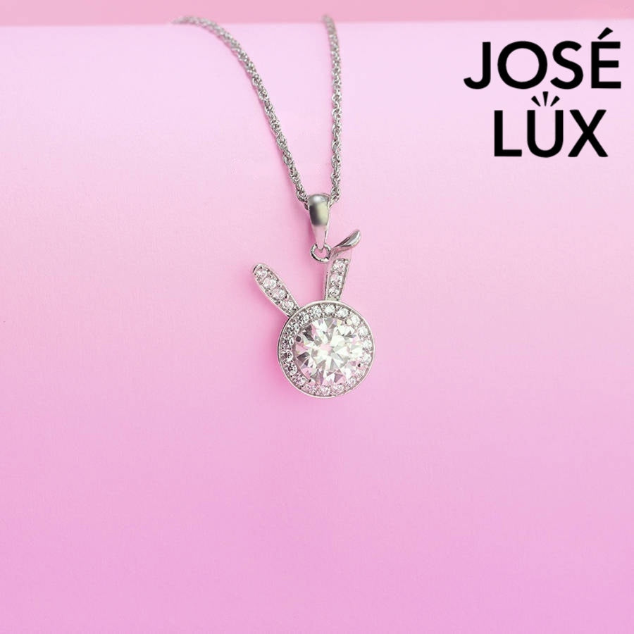 Charming round moissanite halo pendant features playful bunny ear accents with pavé stones, creating a whimsical statement piece in sterling silver.