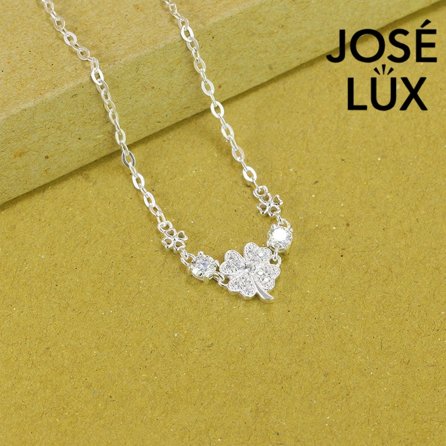 Star clover station moissanite bracelet in sterling silver showcases pave-set four-leaf clover centerpiece with brilliant stones totaling 0.6 carats on cable chain.